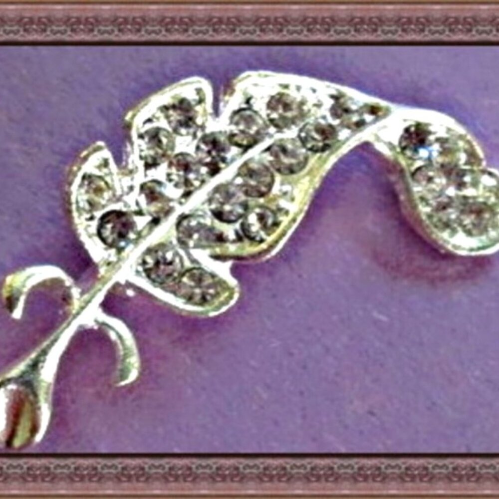 Silver Tone Feather Design Brooch With Clear Crystals